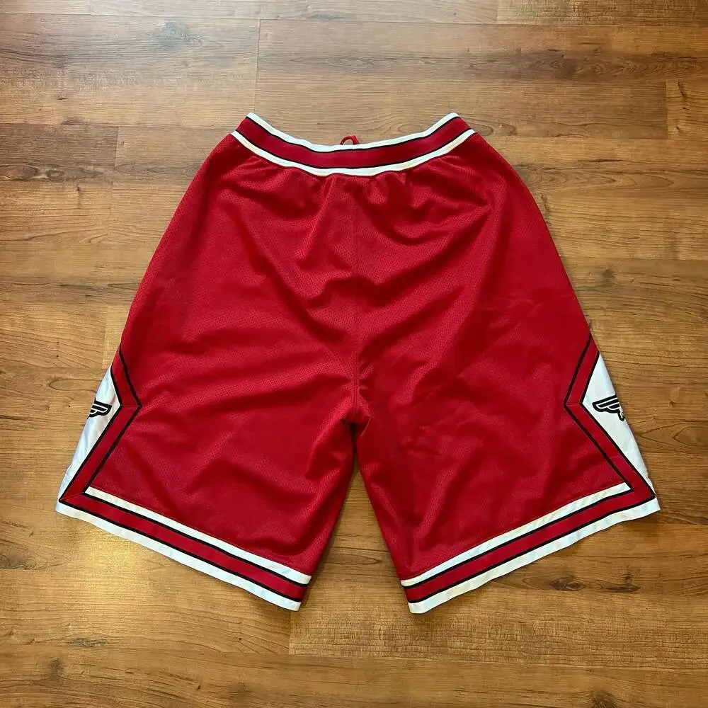 Vintage 80s/90s OG Air Jordan Wings Mesh Basketball Shorts Red & White Size L